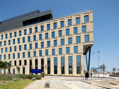 Boho X exterior of office building with plaza and planting Boho X exterior of office building with plaza and planting